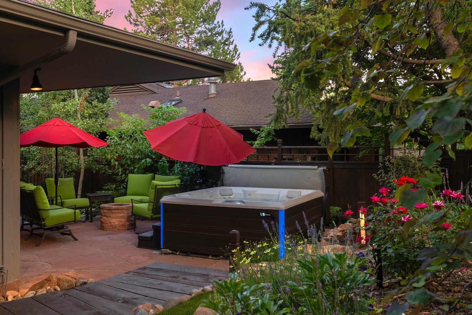 Outdoor seating area at dusk in Boulder, CO by Nature's Way Landscapes